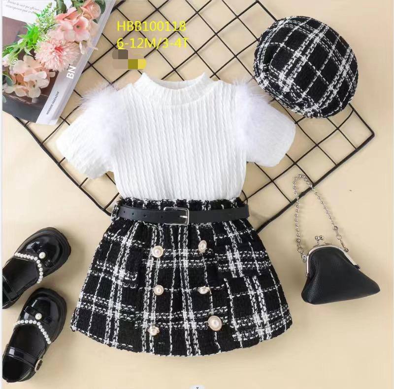 white  shirt with checkered skirt and cap